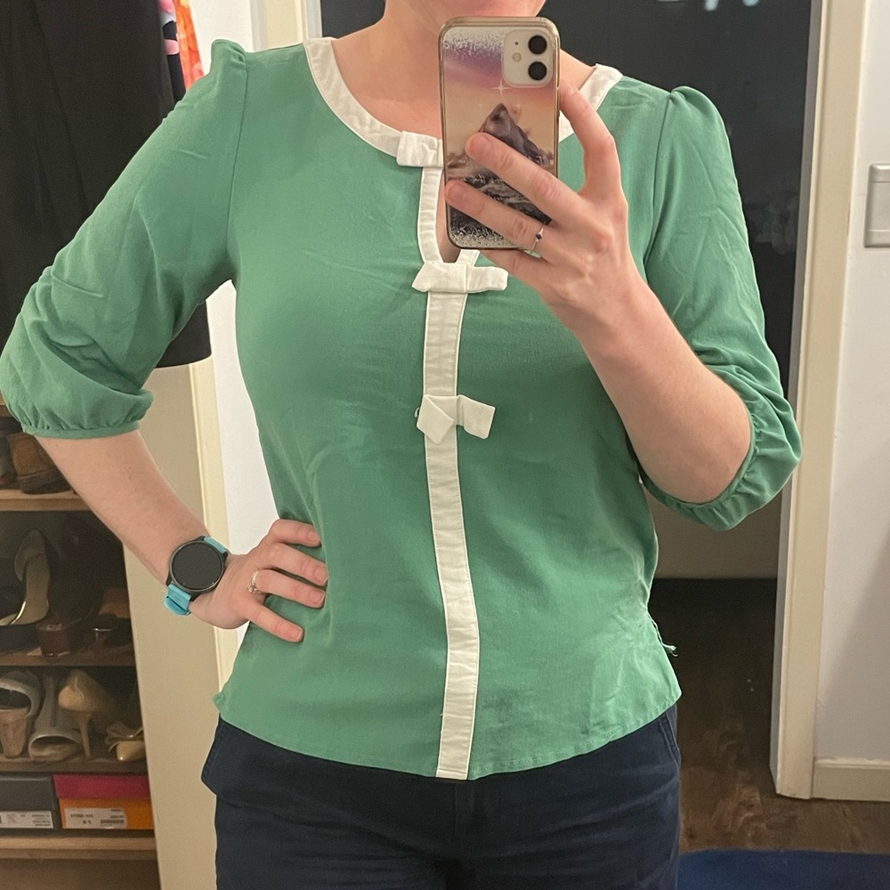 ModCloth peekaboo bow blouse light green and white